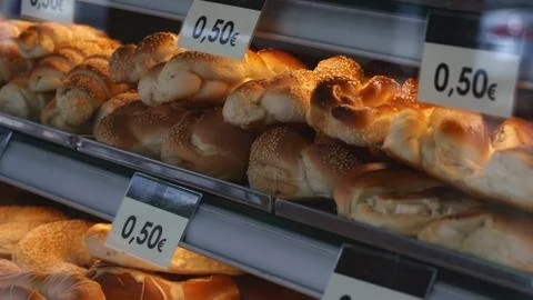 Bread rolls in a shop window Stock Photos