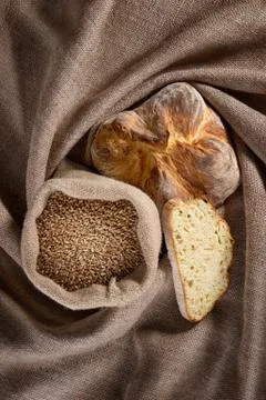 Bread on a sackcloth Stock Photos