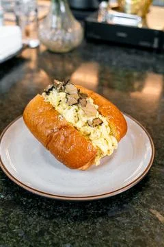 Bread with scrambled eggs and truffle mushroom 스톡 사진
