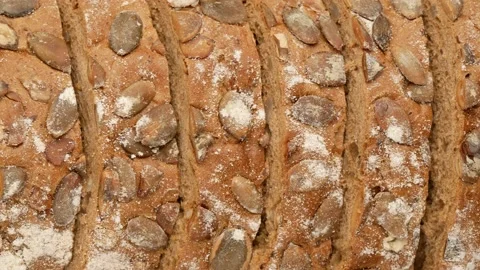 Bread with seeds. Pieces of bread - background. Stock Footage 141363549
