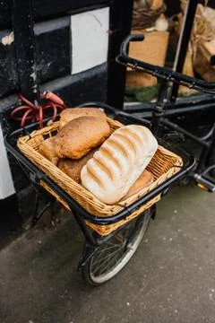 Bread selection in a bicycle basket Stock Photos