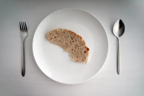 Bread served on a white table. Stock Photos