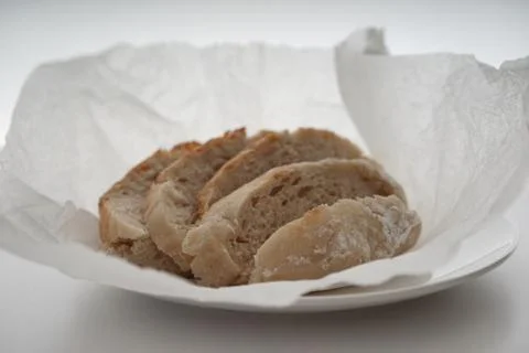 Bread served on a white table. Stock Photos