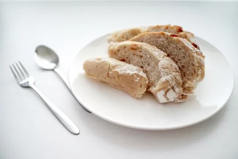 Bread served on a white table. Stock Photos