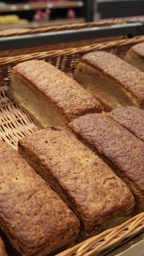 Bread on the shelf in the store vertical video Stock Footage 285328898