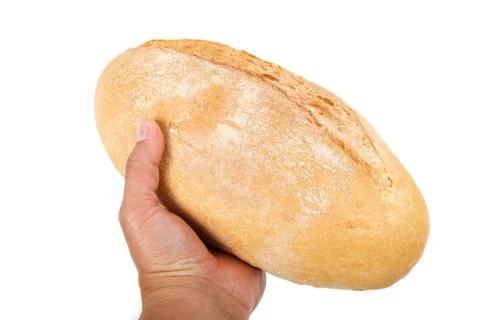 Bread slice in hand on white background. Stock Photos