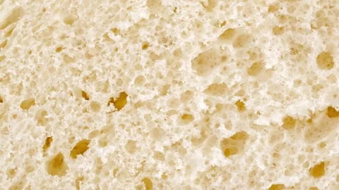 Bread, slice, inner part baked dough with pores rotating Stock-Footage 246851773