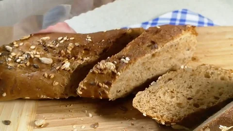 Bread, sliced, baguette Stock Footage 76240786