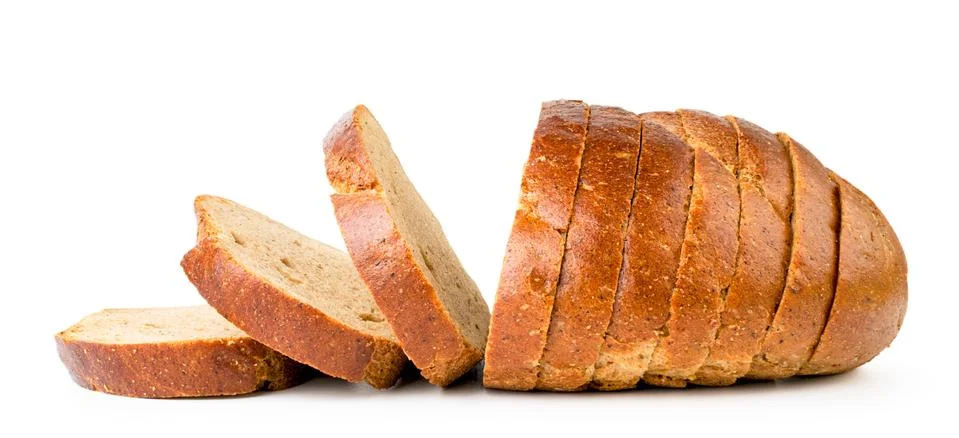 Bread sliced close up on a white. The view from the side. Stock Photos
