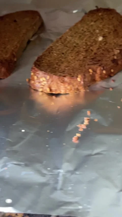 Bread sliced in the oven Stock Footage 287667172