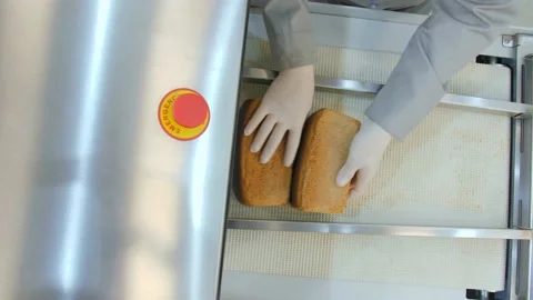 Bread slicer in factory. Bread production Stock Footage 131821175
