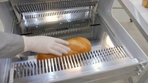 Bread slicer in factory. Stock Footage 131820850