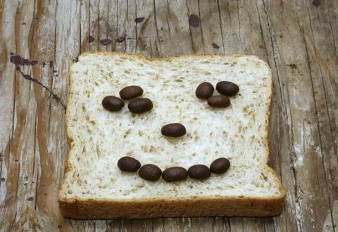Bread slices with coffee beans 스톡 사진