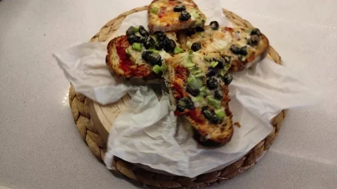 Bread Slices with lots of Sauce on a Rotating Wooden Board Video stock 144045247