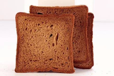 Bread slices on white background Stock Photos