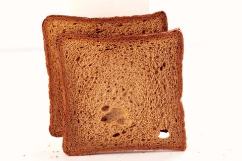 Bread slices on white background Stock Photos