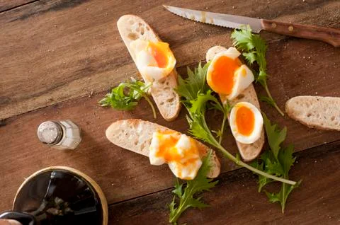 Bread soldiers with eggs Stock Photos