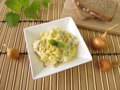 Bread spread with corn and lemon balm Stock Photos