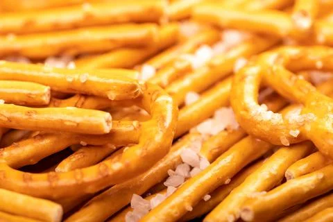 Bread sticks and bread figures with salt. Close-up Background image. Stock Photos