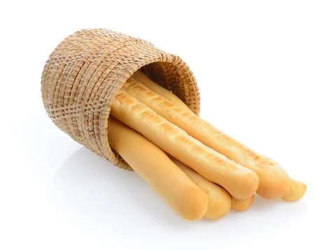Bread sticks in basket isolated on white background Stock Photos