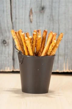 Bread Sticks in a bucket Stock Photos