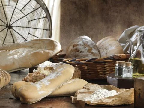Bread sticks on a rustic backdrop Stock Photos