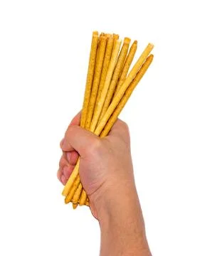 Bread Straws in the hand Stock Photos