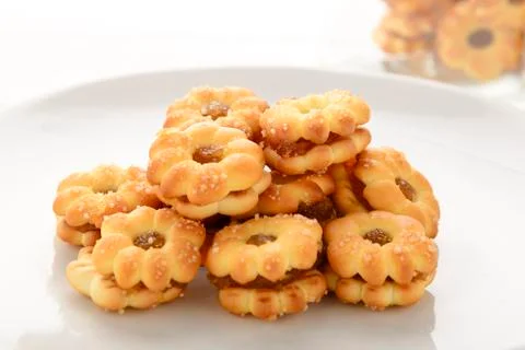 Bread stuffed pineapple on white plate Stock Photos