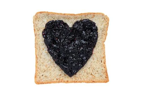 Bread with sweet blackberry jam in shape of heart Stock Photos