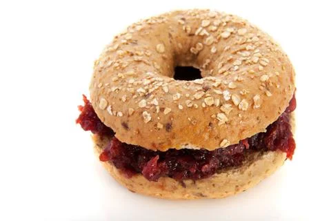 Bread with sweet jam Bread bun with sweet jam isolated over white backgrou... Stock Photos