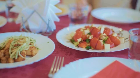 Bread on the table, salad and meat dishes on a plate Stock Footage 129521106