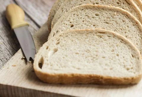 The bread is on the table. Sliced ​​and fresh Stock Photos