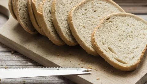 The bread is on the table. Sliced ​​and fresh Stock Photos