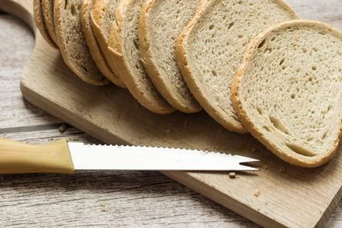 The bread is on the table. Sliced ​​and fresh Stock Photos