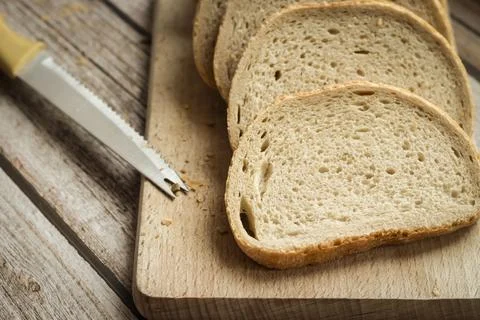 The bread is on the table. Sliced ​​and fresh Stock Photos