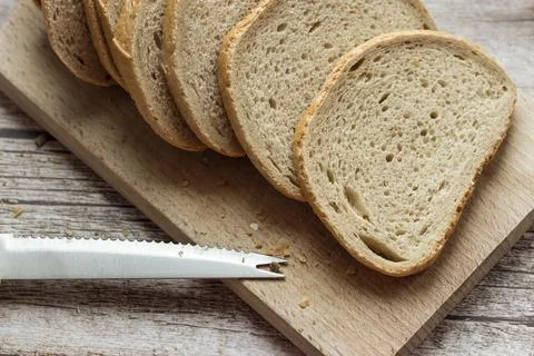 The bread is on the table. Sliced ​​and fresh Stock Photos