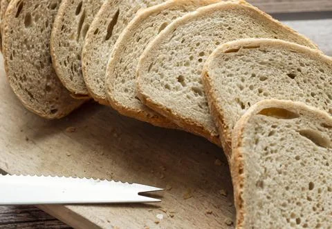 The bread is on the table. Sliced ​​and fresh Stock Photos
