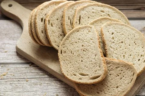 The bread is on the table. Sliced ​​and fresh Stock Photos