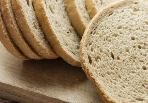 The bread is on the table. Sliced ​​and fresh Stock Photos