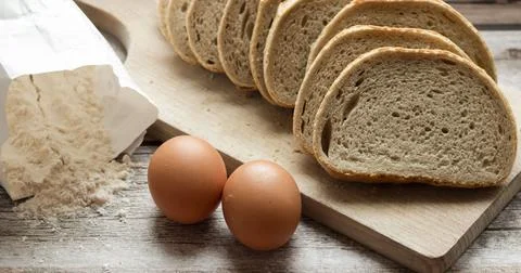 The bread is on the table. Sliced ​​and fresh Stock Photos