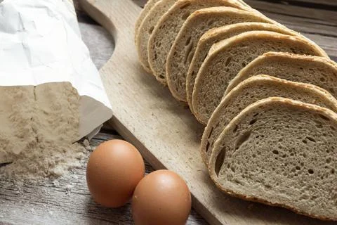 The bread is on the table. Sliced ​​and fresh Stock Photos