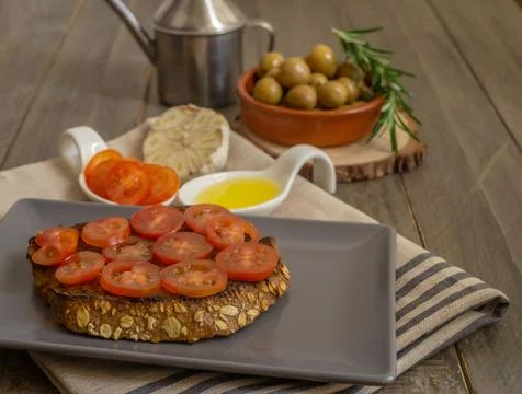Bread toast with cherry tomato Stock Photos