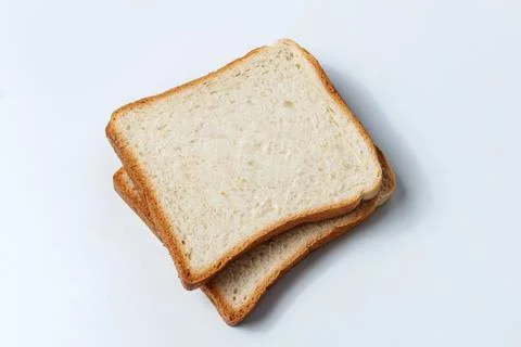 Bread toast on a white background. Flour pastries Stock Photos