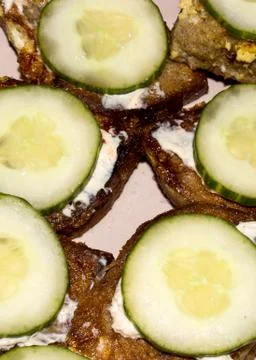 The bread is toasted.Bread with egg and cucumbers. Stock Photos