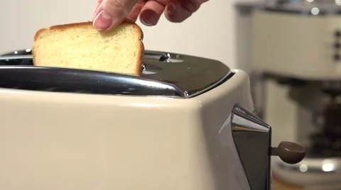 Bread in the toaster. Full HD 1080 video footage. Slow motion. Stock-Footage 55822734