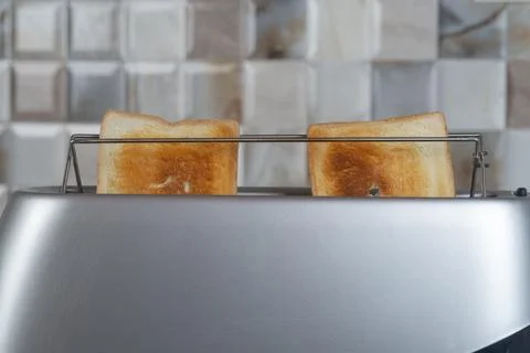 Bread in the toaster. kitchenware Stock Photos