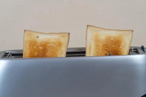 Bread in the toaster. kitchenware Stock Photos