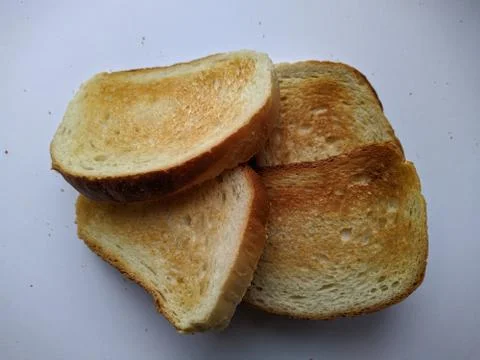 Bread toasts on a white background closeup photo top view Stock Photos