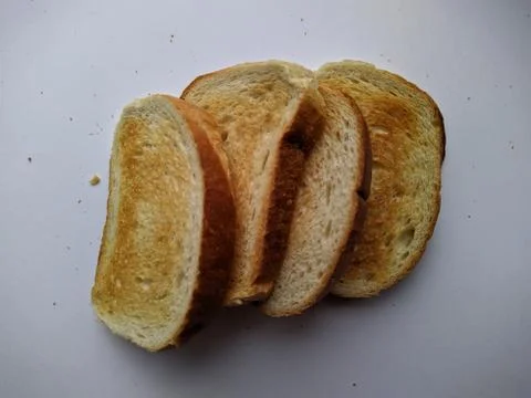 Bread toasts on a white background closeup photo top view Stock Photos