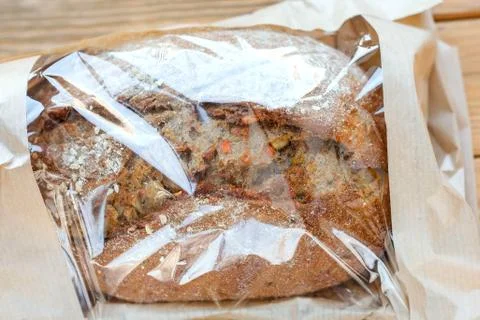 Bread in a transparent bag. Paper packaging. View from above Stock Photos